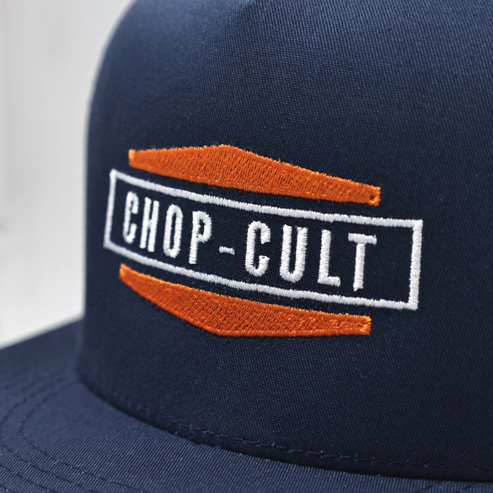 ChopCult's '66 Logo embroidered on a blue Yupoong Classics 5 panel snap back.
Embroidered in the USA