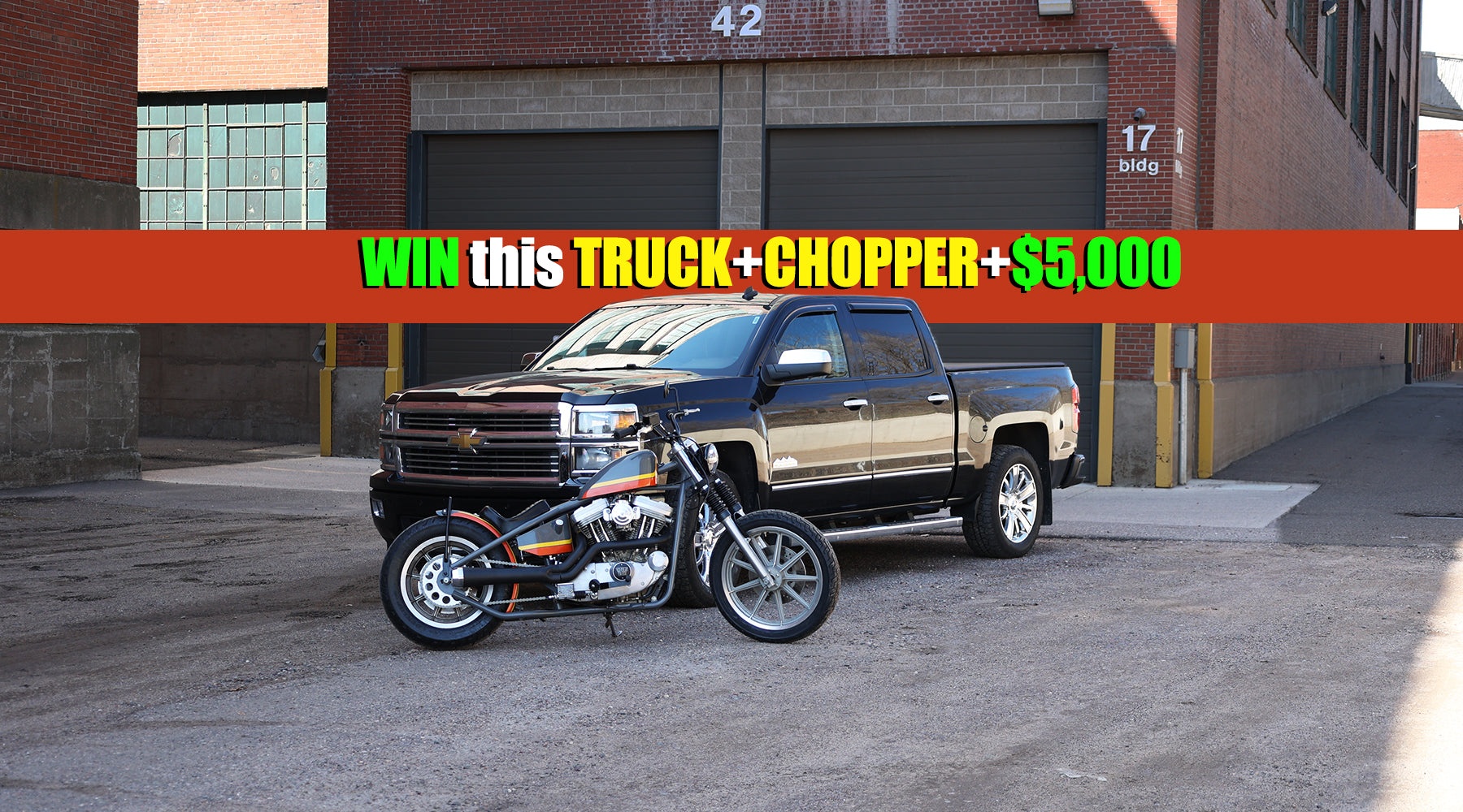 Win a truck and chopper in front of a brick building