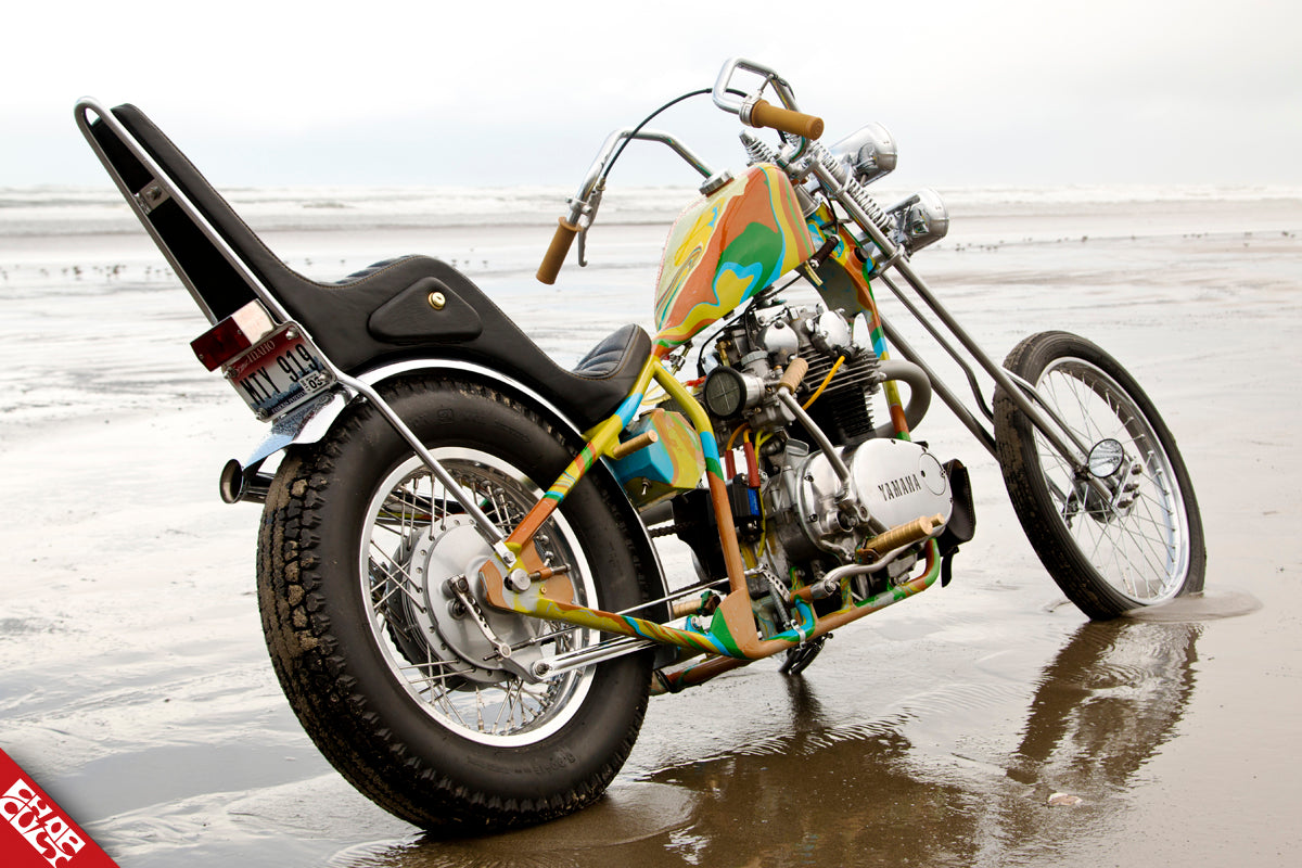 A photo of the colorful bike discussed in this post on the beach