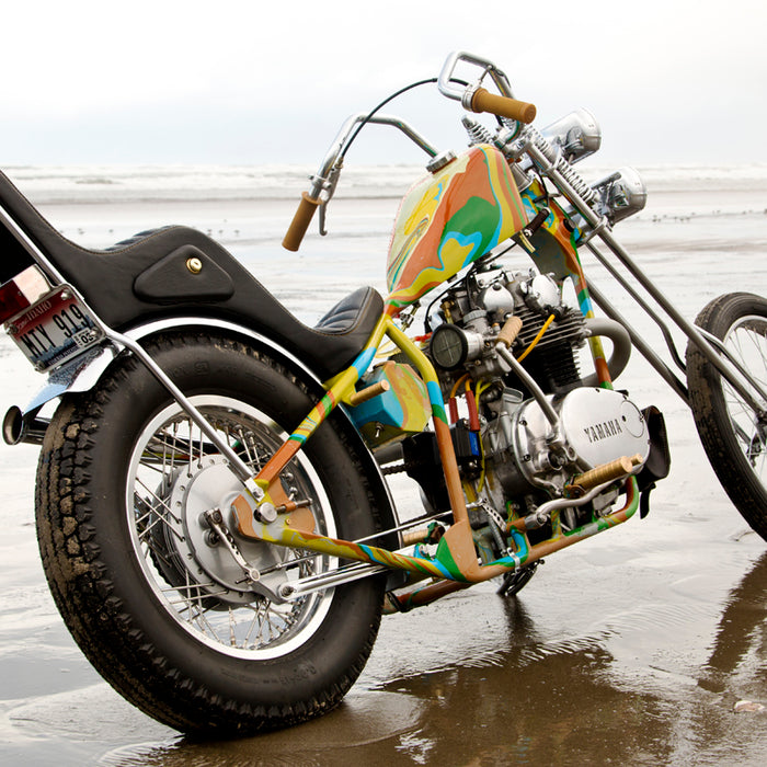 A photo of the colorful bike discussed in this post on the beach