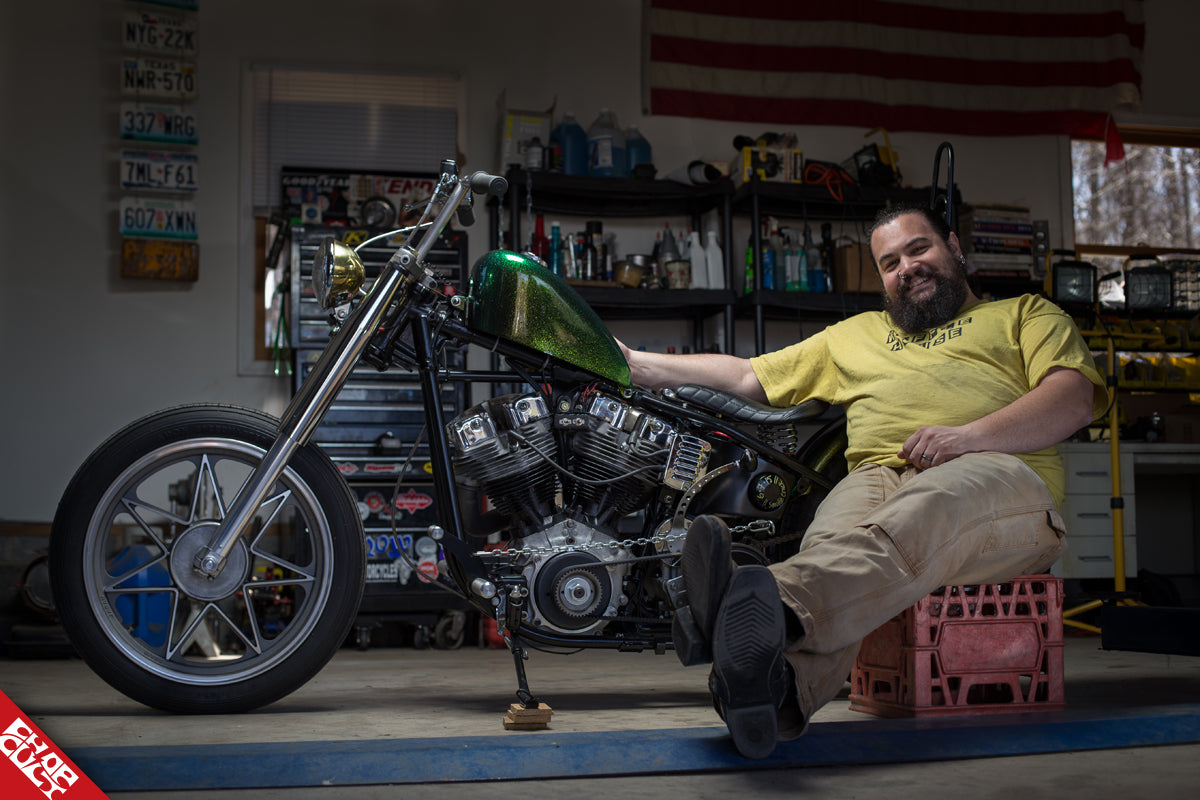 A photo of Lemmy with his green shovelhead discussed in this post. 