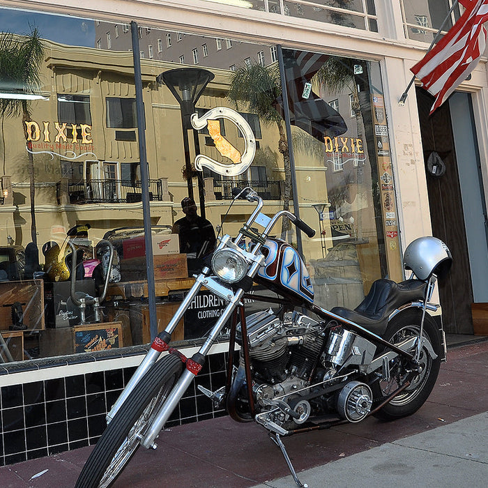 A photo of the panhead discussed in this post in front of a storefront. 