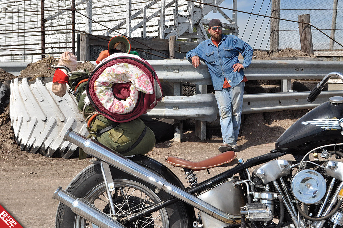 A photo of Jess and his bike