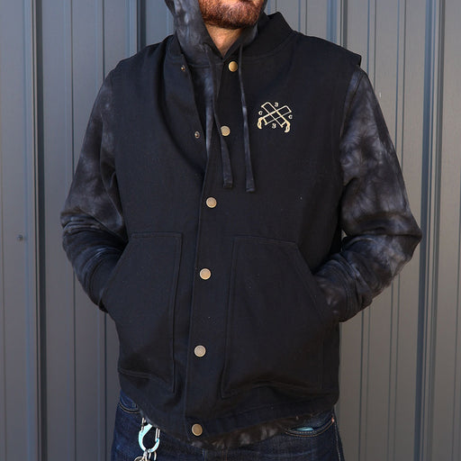 Man wearing black chopcult embroidered vest